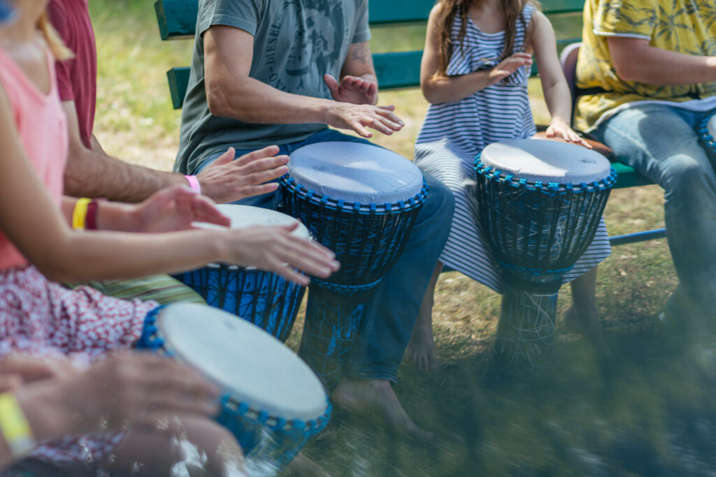 djembe lesson, people learn to play the drum